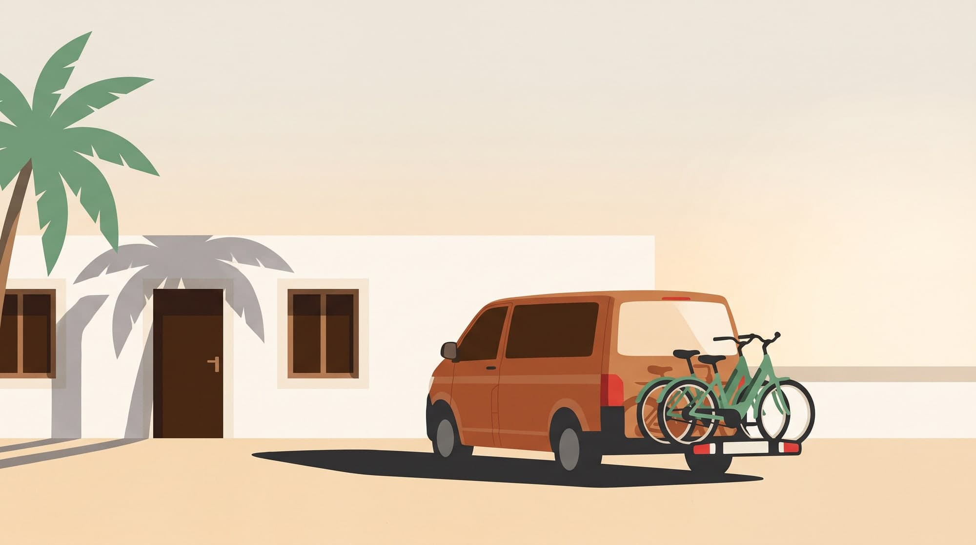 Our van outside a hotel with two e-bikes on the rack
